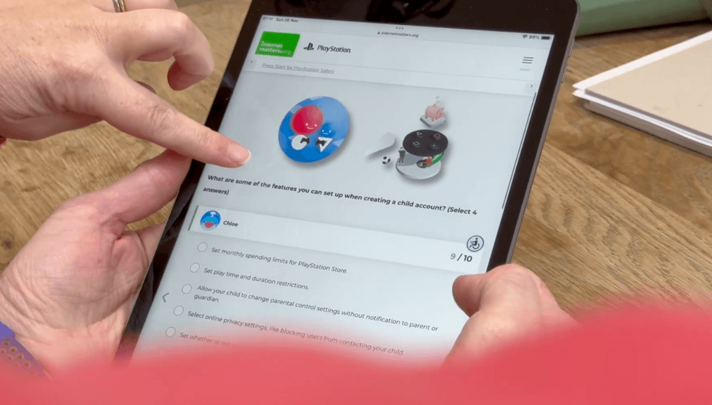 An ipad screen showing the Press Start for PlayStation Safety quiz created in partnership with Internet Matters