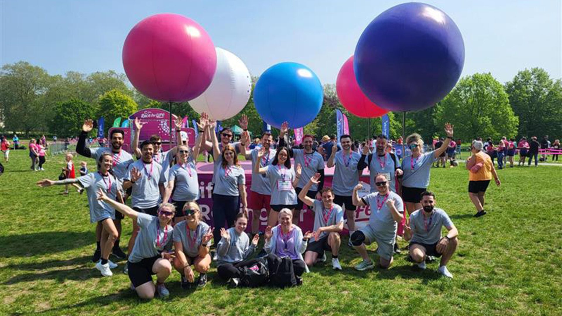 An outdoor group photo of employees that participated in  Race for Life 2024