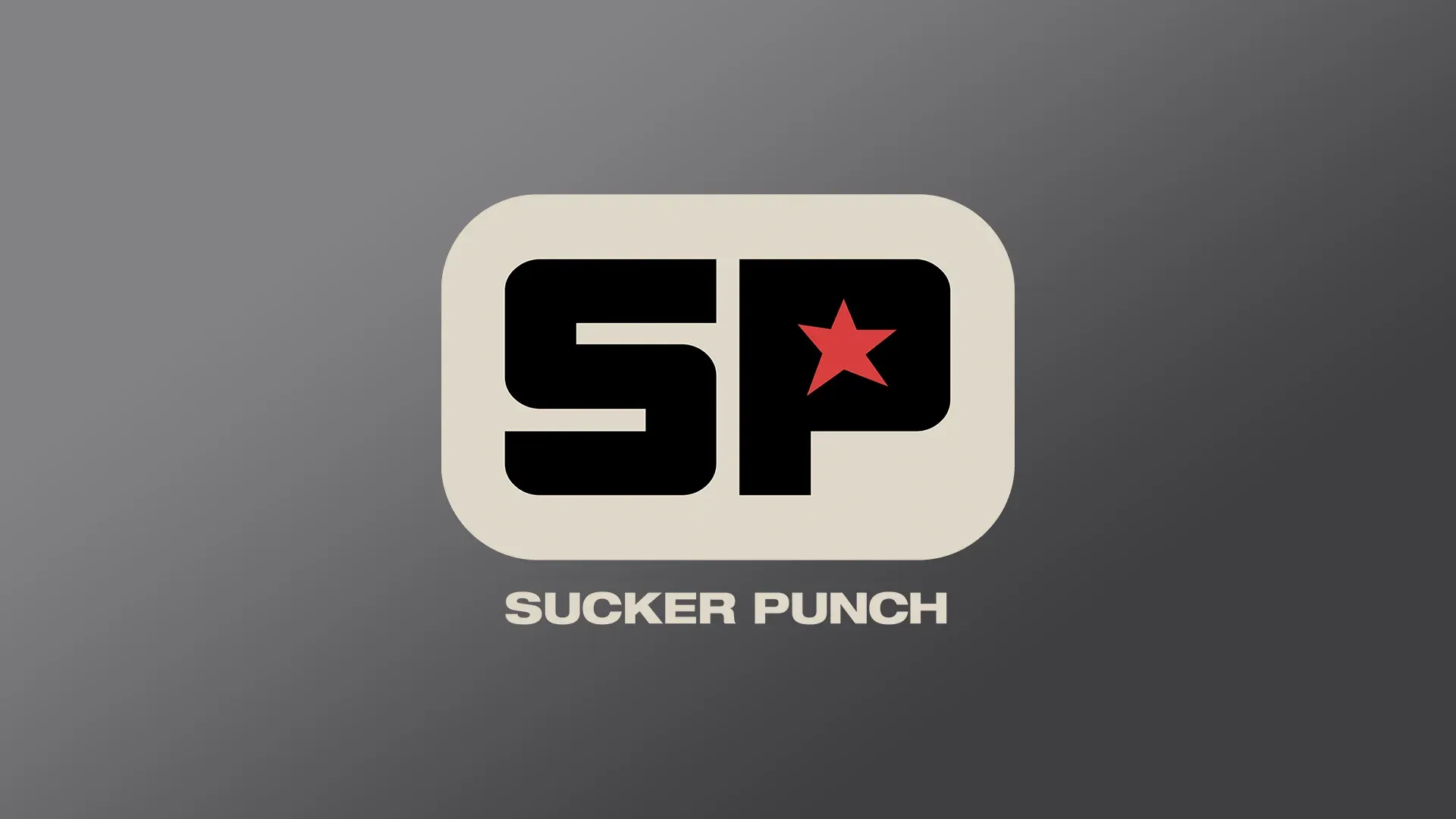 ダークグレーの背景に赤色の星マークが入った『SP』ロゴと『Sucker Punch』の白い社名の描かれたゲーム制作会社スタジオの公式ロゴ画像