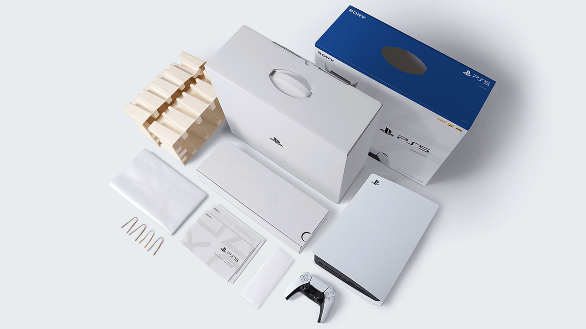 開封されたPlayStation 5の本体、包装材、説明書、アクセサリーが並べられている。