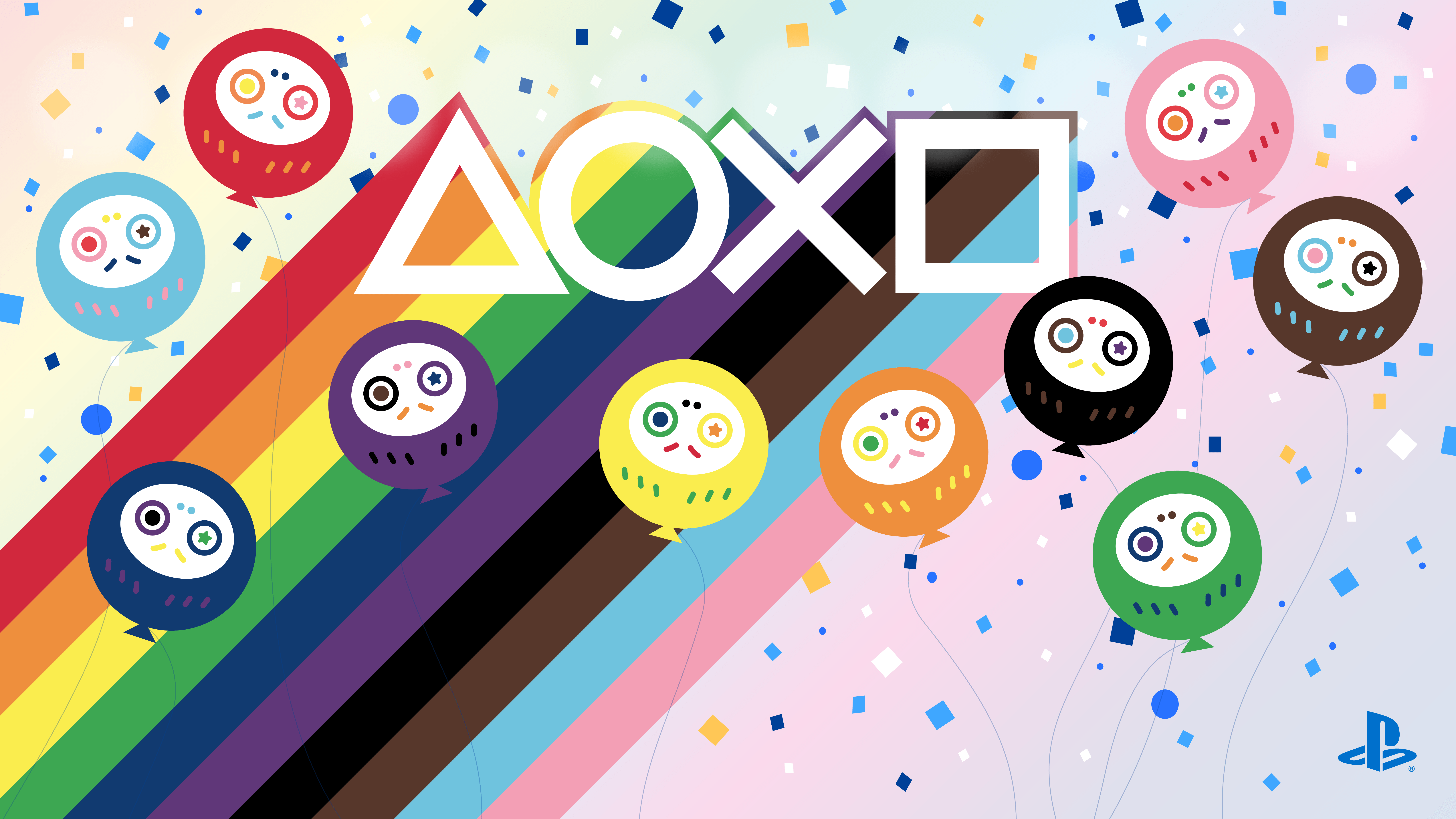 A festive PlayStation graphic featuring a large, diagonal Progress Pride flag rainbow. White PlayStation controller symbols are centered at the top, surrounded by colorful balloons shaped like Japanese daruma dolls floating amidst falling confetti.